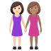 👩🏻‍🤝‍👩🏽 women holding hands: light skin tone, medium skin tone display on JoyPixels